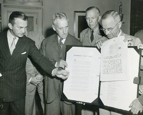 President Truman with Japanese surrender documents